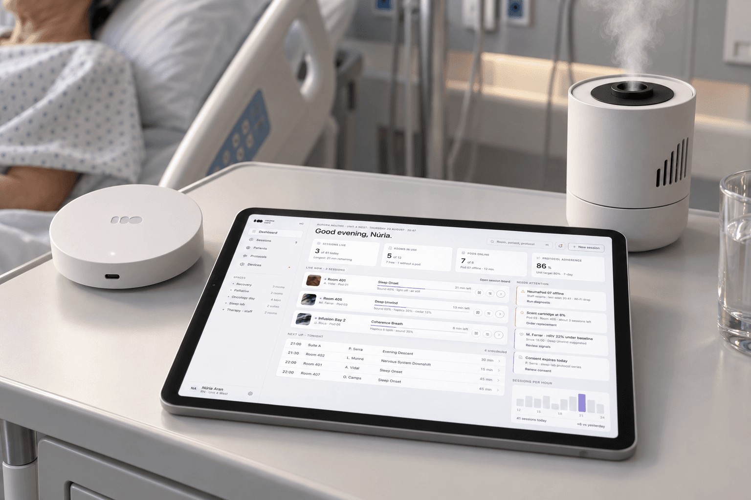 Habitación de hospital con un NeumaPod 1, un NeumaSense y la aplicación de NeumaCare en una tableta