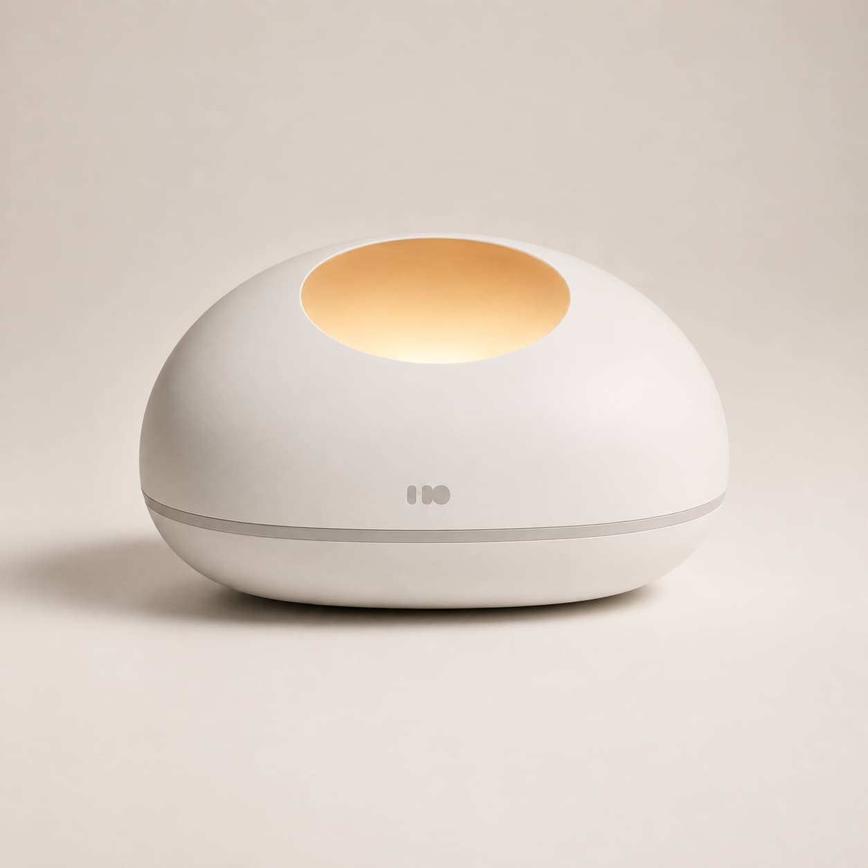 NeumaPod 2 in white, warm light glowing